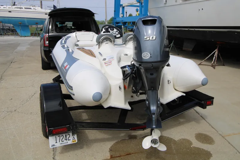 Slide: The Image of 2018 Avon Seasport 400 Deluxe NEO with 50hp engine on trailer. - 4