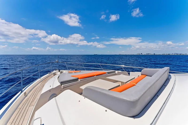 Slide: The Image of Luxurious 2014 Lazzara 64 yacht deck with ocean view and comfortable seating. - 19