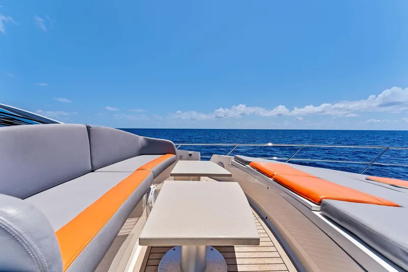 Slide: The Image of Luxurious 2014 Lazzara 64 yacht deck with stylish seating and ocean view. - 22