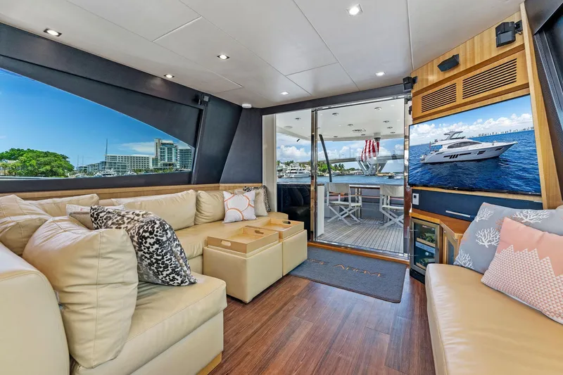 Slide: The Image of Luxurious interior of 2014 Lazzara 64 yacht with plush seating and scenic views. - 51