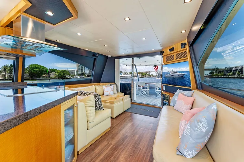 Slide: The Image of Luxurious interior of 2014 Lazzara 64 yacht with modern furnishings and waterfront view. - 52