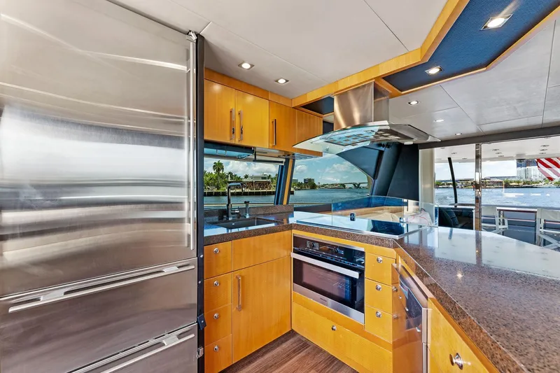 Slide: The Image of Luxurious kitchen interior of 2014 Lazzara 64 yacht with modern appliances and waterfront view. - 56