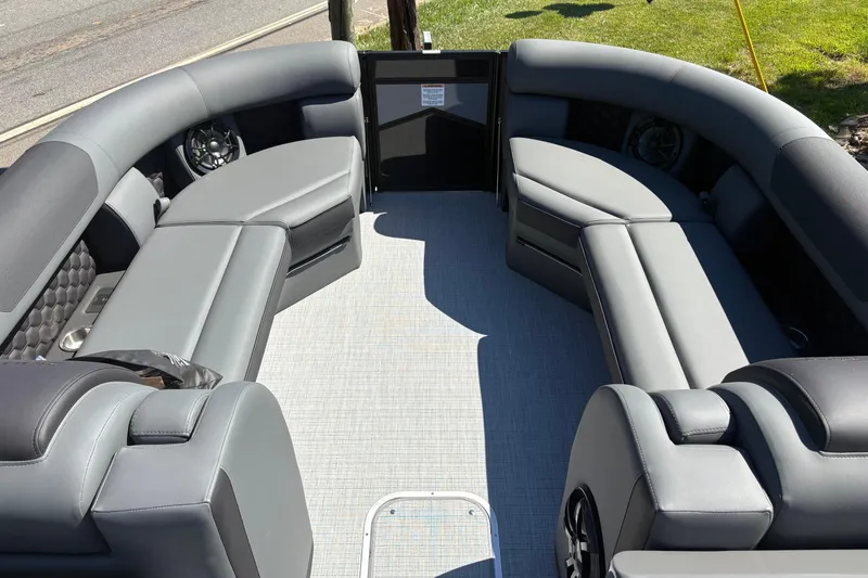 Slide: The Image of Luxurious interior of 2026 South Bay 525RS pontoon boat with plush seating. - 5