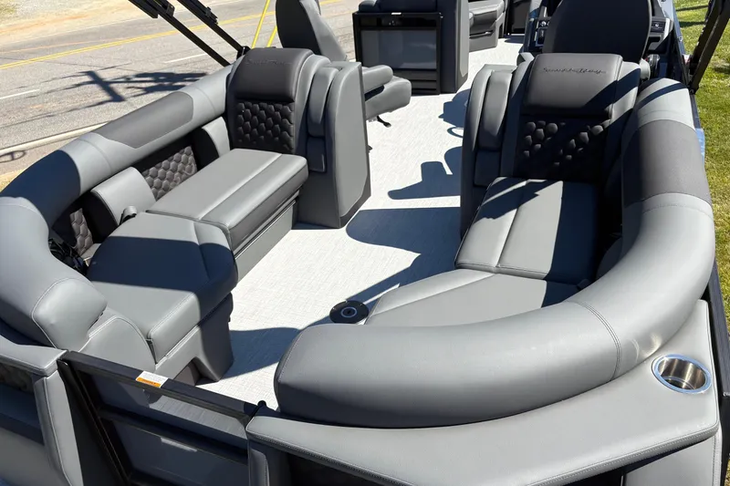 Slide: The Image of Luxurious interior of 2026 South Bay 525RS pontoon boat with plush seating. - 6