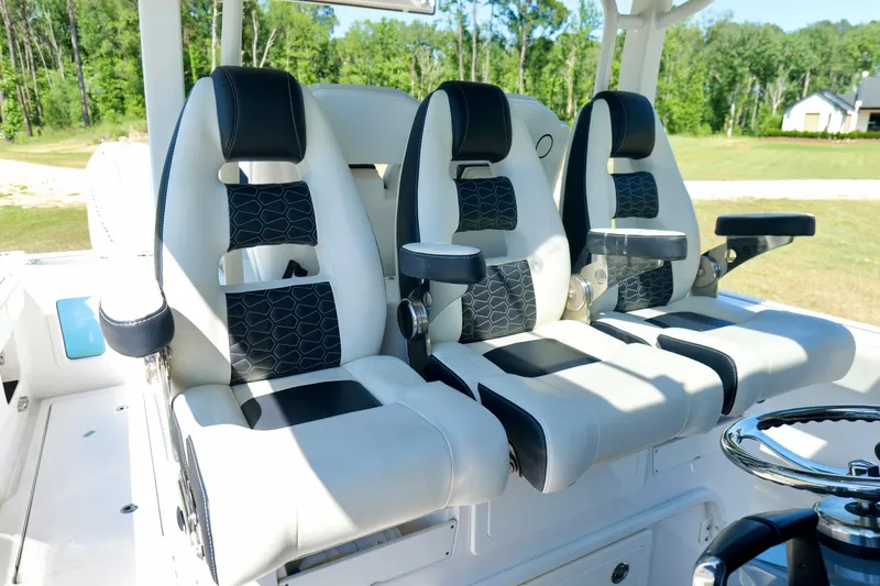 Slide: The Image of Luxury seating on 2024 Tidewater 380 CC Adventure boat, featuring modern design and comfort. - 19