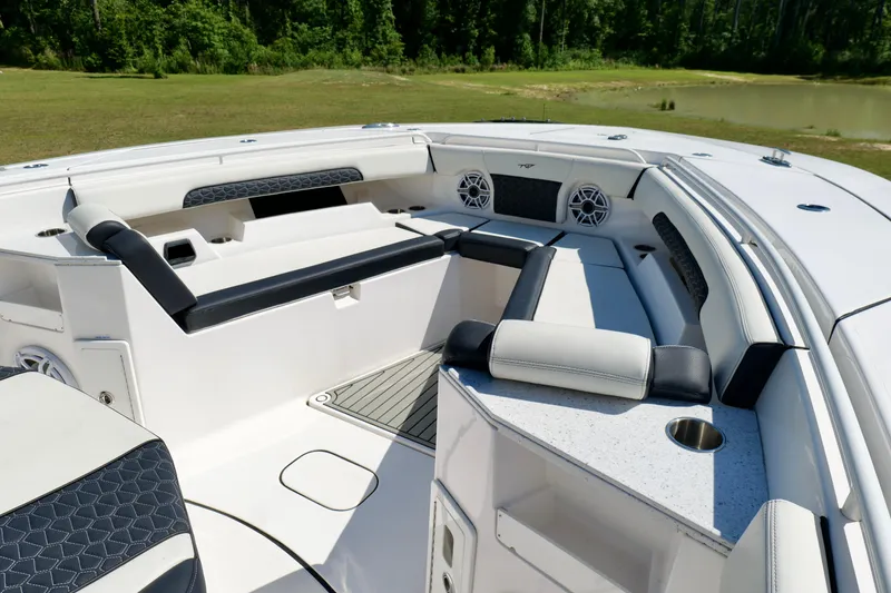 Slide: The Image of 2024 Tidewater 380 CC Adventure boat interior with luxurious seating and modern design. - 33