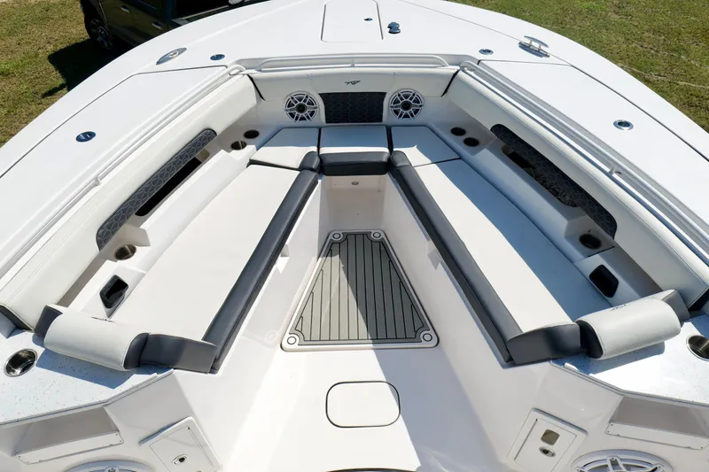 Slide: The Image of 2024 Tidewater 380 CC Adventure boat interior with spacious seating and modern design. - 34