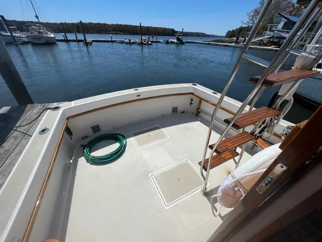 Slide: The Image of 1989 Cape Dory Flybridge Cruiser at dock with water view. - 15