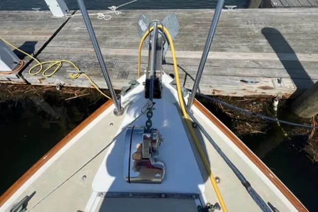 Slide: The Image of Bow view of a 1989 Cape Dory Flybridge Cruiser at dock. - 19