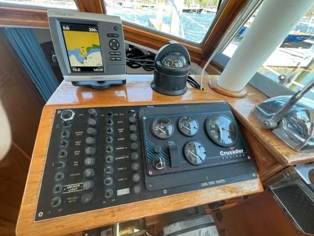 Slide: The Image of Dashboard of a 1989 Cape Dory Flybridge Cruiser with navigation system. - 8