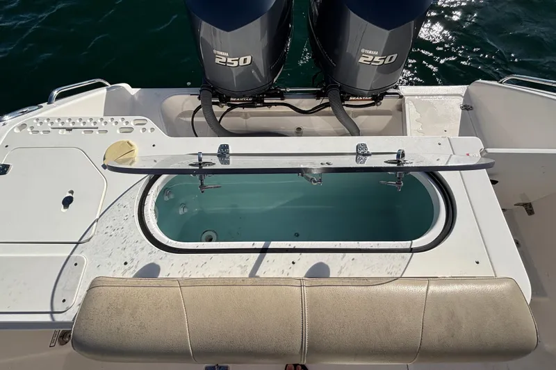 Slide: The Image of 2015 Pursuit S 280 Sport boat with dual Yamaha 250 engines and livewell. - 21