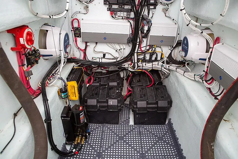 Slide: The Image of Electrical system of a 2007 Speed Sport 25 boat, featuring batteries and wiring. - 7