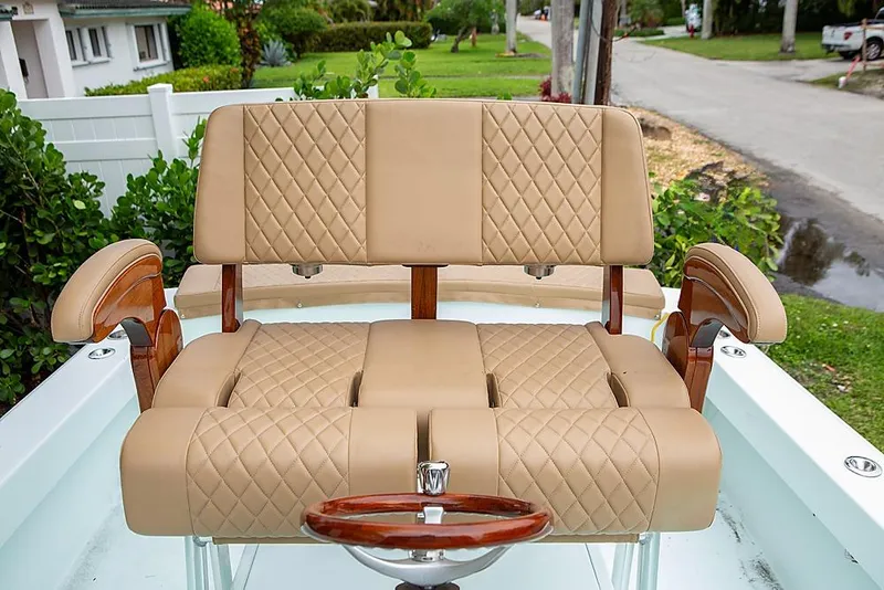 Slide: The Image of Luxurious tan leather boat seating on a 2007 Speed Sport 25 model. - 9