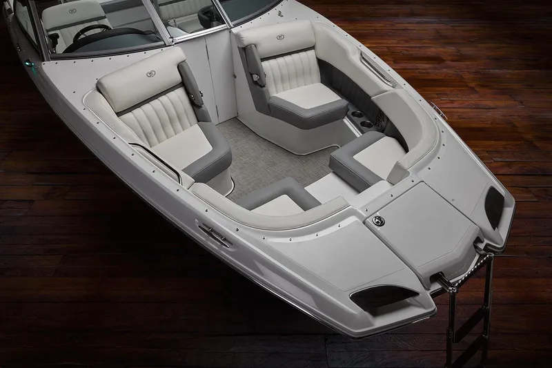 Slide: The Image of Manufacturer Provided Image: 2019 Cobalt 25SC boat interior with white and gray seating. - 4