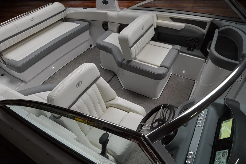 Slide: The Image of Manufacturer Provided Image: 2019 Cobalt 25SC boat interior with luxurious seating and modern dashboard. - 7