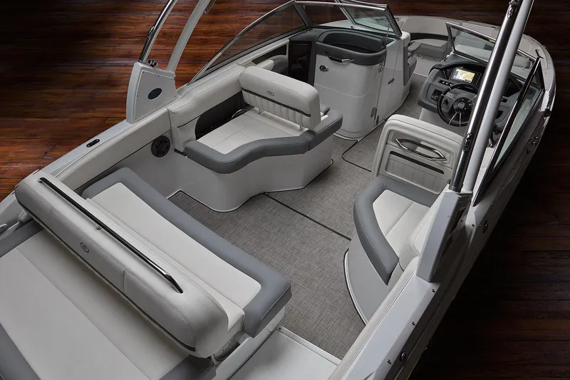 Slide: The Image of Manufacturer Provided Image: 2019 Cobalt 25SC boat interior with luxurious seating and modern dashboard. - 8