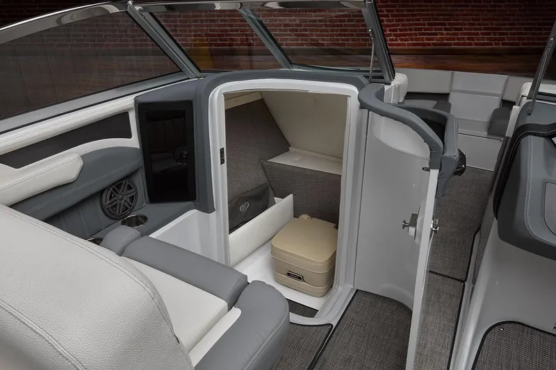 Slide: The Image of Manufacturer Provided Image: 2019 Cobalt 25SC boat interior with seating and storage compartment. - 9