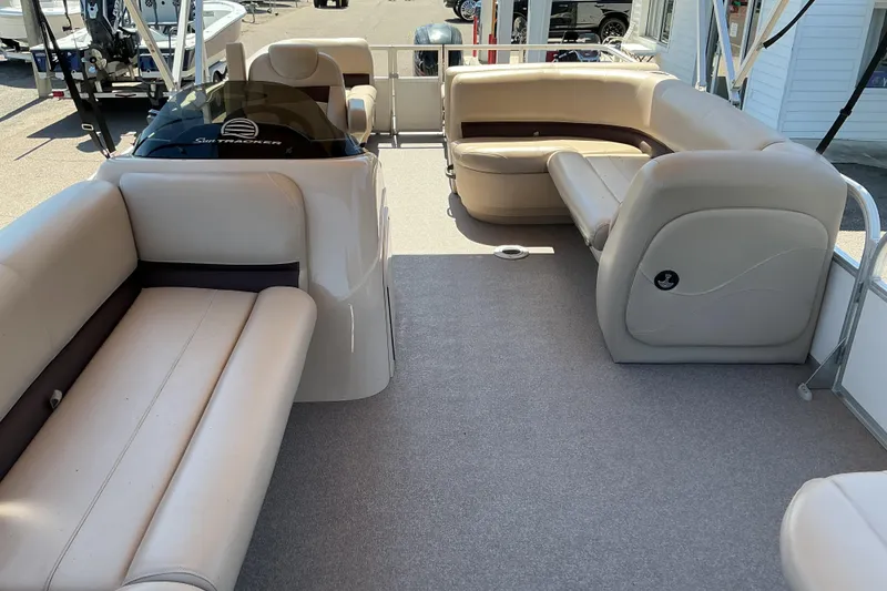 Slide: The Image of 2017 Sun Tracker Party Barge 24 DLX interior with spacious seating and modern design. - 7