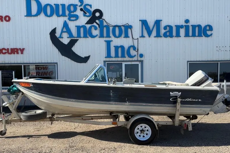 The Image of 1983 Crestliner 16 boat on trailer outside Doug's Anchor Marine Inc. - 1