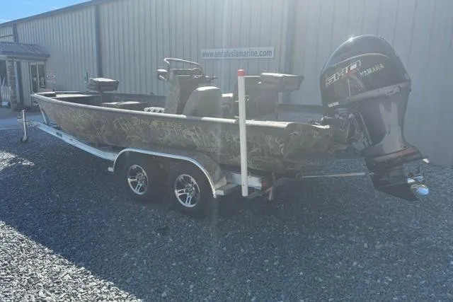Slide: The Image of 2026 War Eagle 2170 Blackhawk boat on trailer with Yamaha outboard motor. - 8