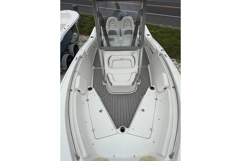 Slide: The Image of 2016 Tidewater 210 LXF boat with sleek seating and modern design. - 5