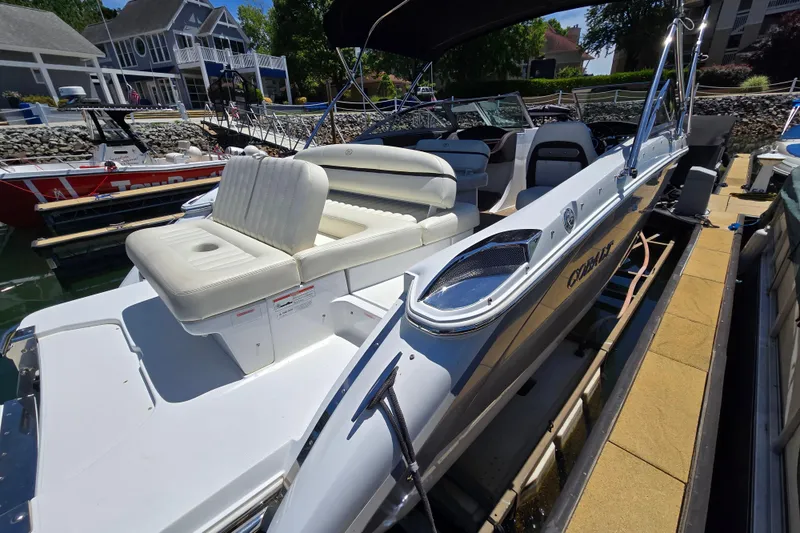 Slide: The Image of 2016 Cobalt R3 boat docked, featuring sleek design and comfortable seating. - 16