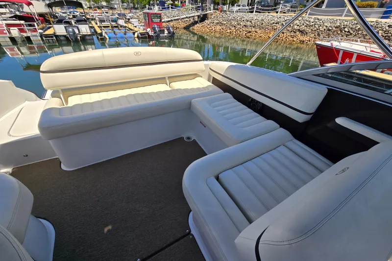 Slide: The Image of Luxurious interior of a 2016 Cobalt R3 boat docked at a marina. - 27
