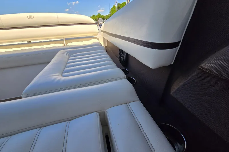 Slide: The Image of Interior of a 2016 Cobalt R3 boat featuring white cushioned seating. - 28