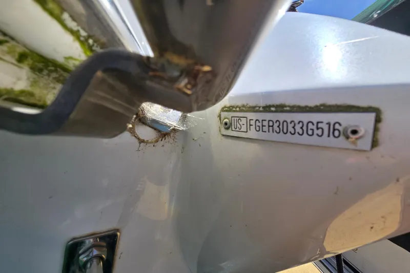 Slide: The Image of Close-up of a 2016 Cobalt R3 boat hull identification number plate. - 45
