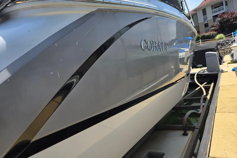 Slide: The Image of 2016 Cobalt R3 boat on trailer, close-up view of sleek hull design. - 5