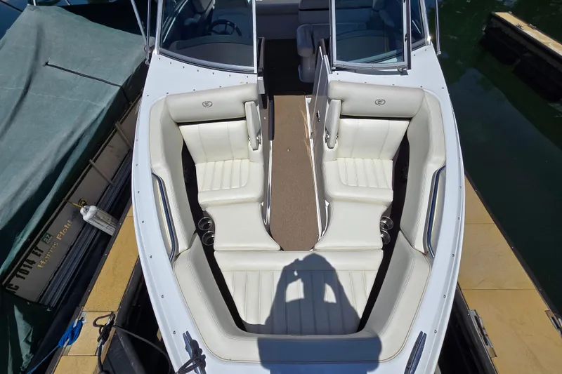 Slide: The Image of 2016 Cobalt R3 boat interior with white seating and open bow design. - 7
