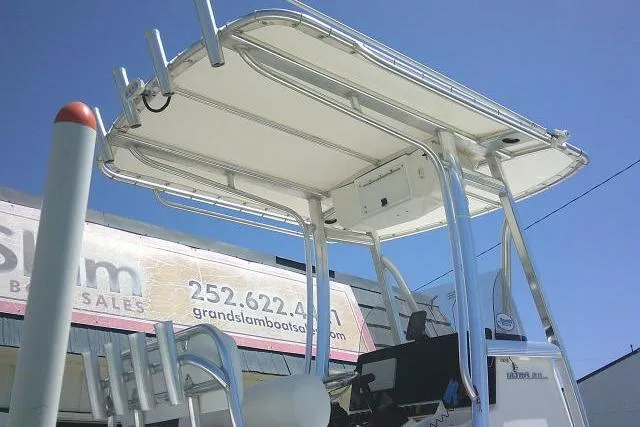Slide: The Image of 2017 Sea Hunt Ultra 211 boat with T-top, displayed at Grand Slam Boat Sales. - 13