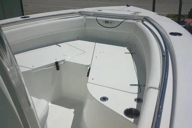 Slide: The Image of 2017 Sea Hunt Ultra 211 boat interior, featuring spacious seating and sleek design. - 14