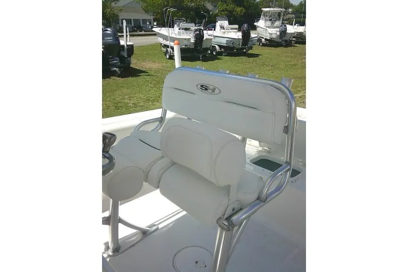 Slide: The Image of 2017 Sea Hunt Ultra 211 boat seat with white upholstery and stainless steel frame. - 35