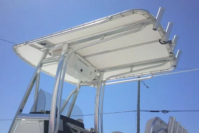 Slide: The Image of 2017 Sea Hunt Ultra 211 boat with T-top against clear blue sky. - 8