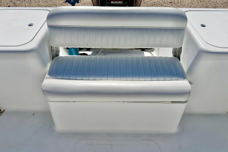 Slide: The Image of White cushioned seating on a 2005 Sea Pro 220 Walk Around boat. - 10