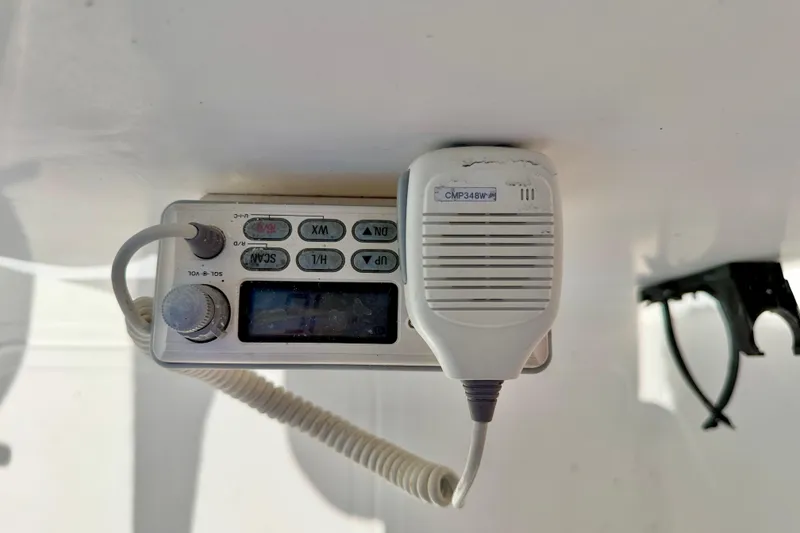 Slide: The Image of Marine radio equipment on a 2005 Sea Pro 220 Walk Around boat. - 24