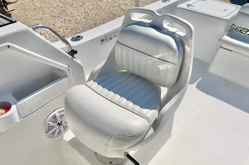 Slide: The Image of White captain's chair on 2005 Sea Pro 220 Walk Around boat deck. - 25