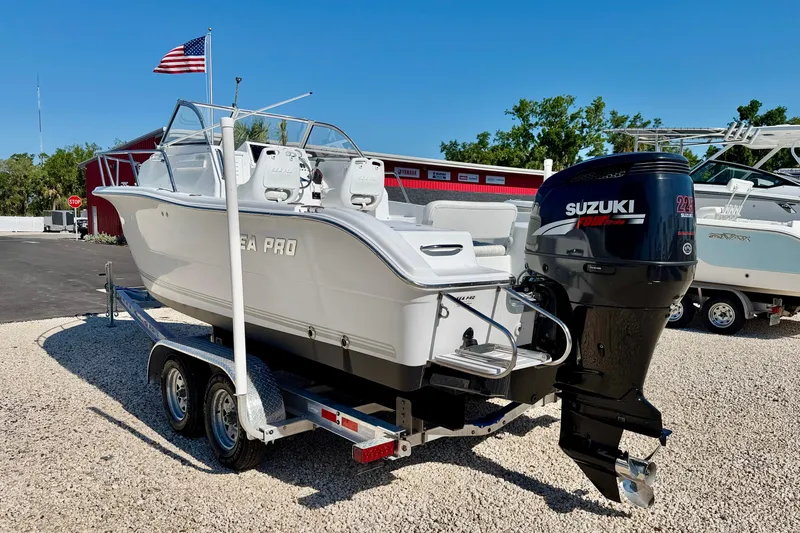 Slide: The Image of 2005 Sea Pro 220 Walk Around boat on trailer with Suzuki outboard motor. - 7