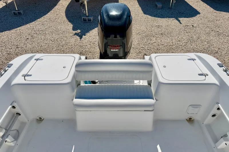 Slide: The Image of 2005 Sea Pro 220 Walk Around boat with Suzuki 225 engine, rear seating view. - 9