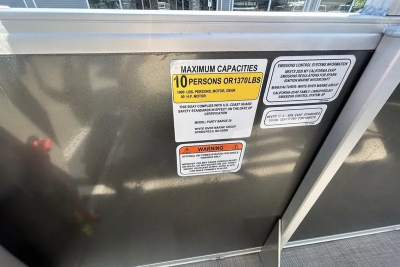 Slide: The Image of 2021 Sun Tracker Party Barge 20 DLX capacity label, showing maximum 10 persons or 1370 lbs. - 17