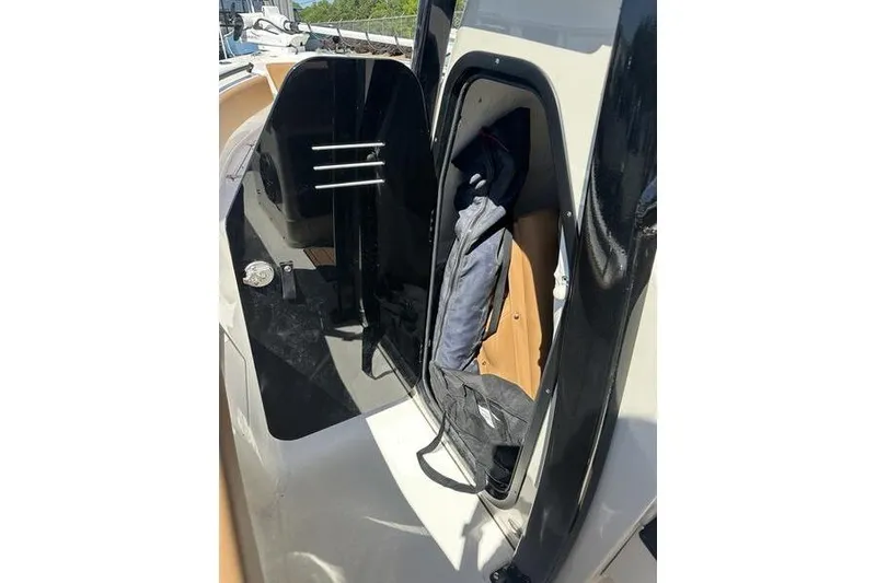 Slide: The Image of Interior view of 2026 Key West 239 FSR boat storage compartment. - 18