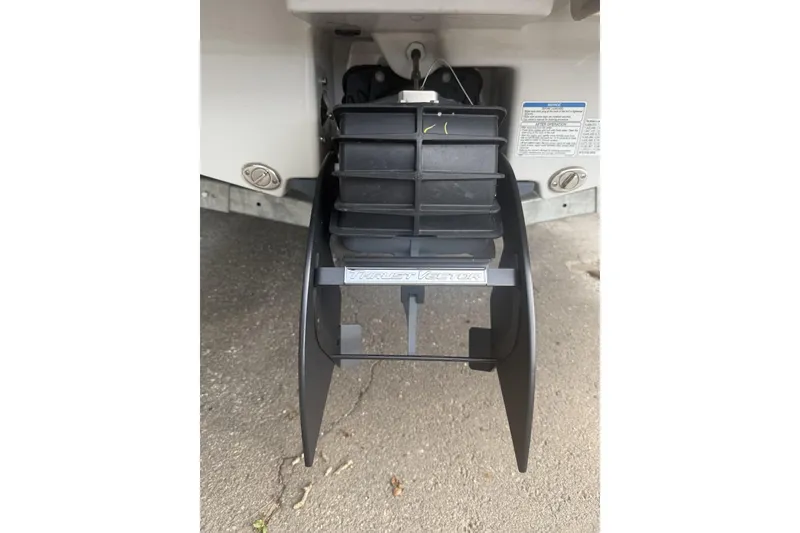 Slide: The Image of 2025 Yamaha Boats 195S thrust vector system close-up on pavement. - 14