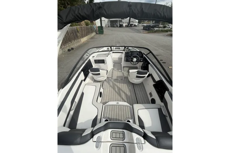 Slide: The Image of 2025 Yamaha Boats 195S interior, featuring sleek seating and modern design elements. - 5