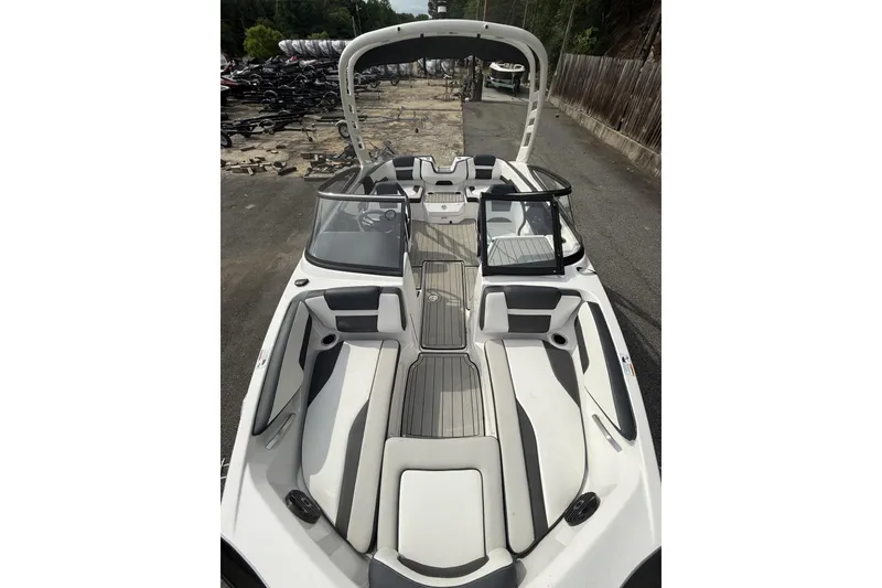 Slide: The Image of 2025 Yamaha Boats 195S interior view, showcasing sleek seating and modern design. - 7