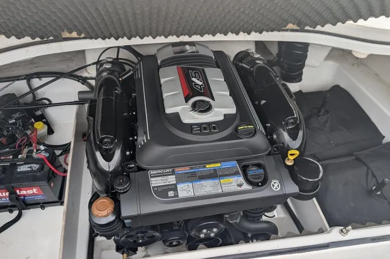 Slide: The Image of Engine compartment of a 2019 Tahoe 500 TF boat with Mercury 4.5L engine. - 13