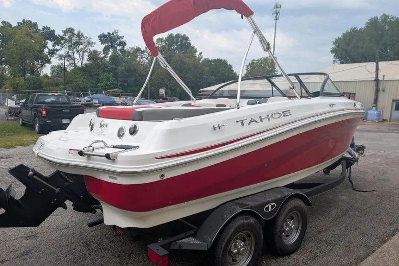 Slide: The Image of 2019 Tahoe 500 TF boat with red and white design on a trailer. - 3