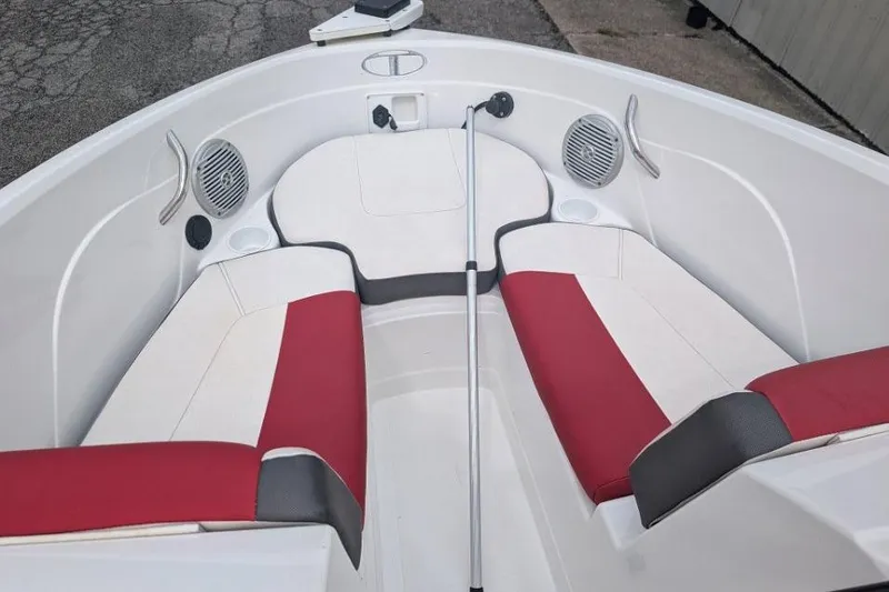 Slide: The Image of Interior of a 2019 Tahoe 500 TF boat with red and white seating. - 9
