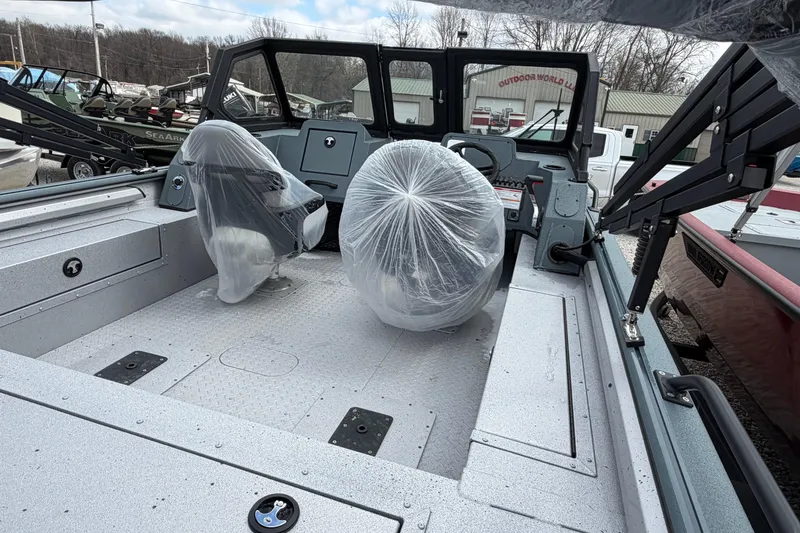 Slide: The Image of 2026 SeaArk ProCat 200 boat interior with covered seats, ready for outdoor adventures. - 3