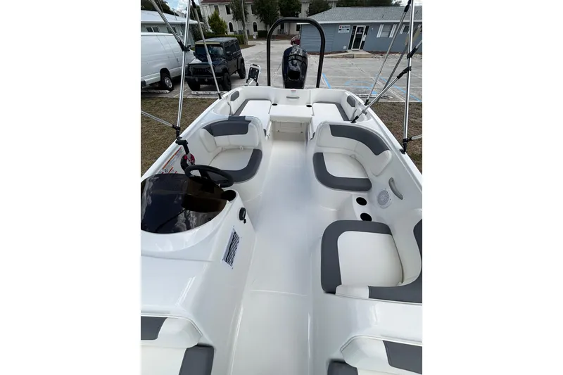Slide: The Image of 2026 Bayliner Element E18 boat interior with spacious seating and modern design. - 11